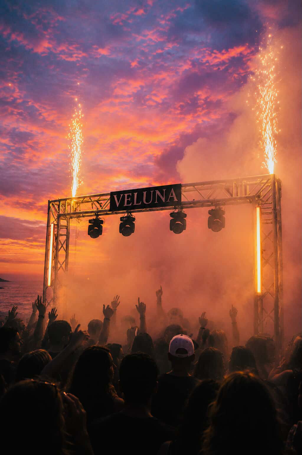Veluna stage and sparks against an orange Bondi sunset